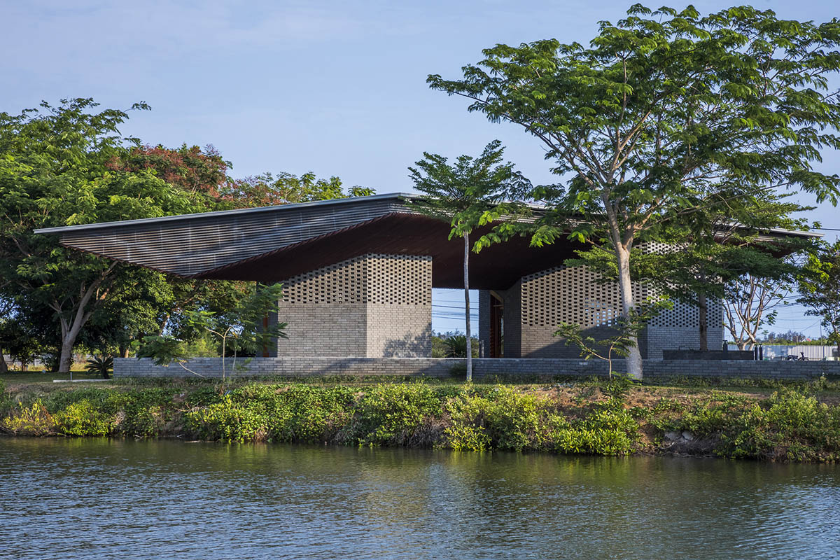 Hexagonal pavilions are hidden under V-shaped roofs that look like a pair of bird wings in Vietnam