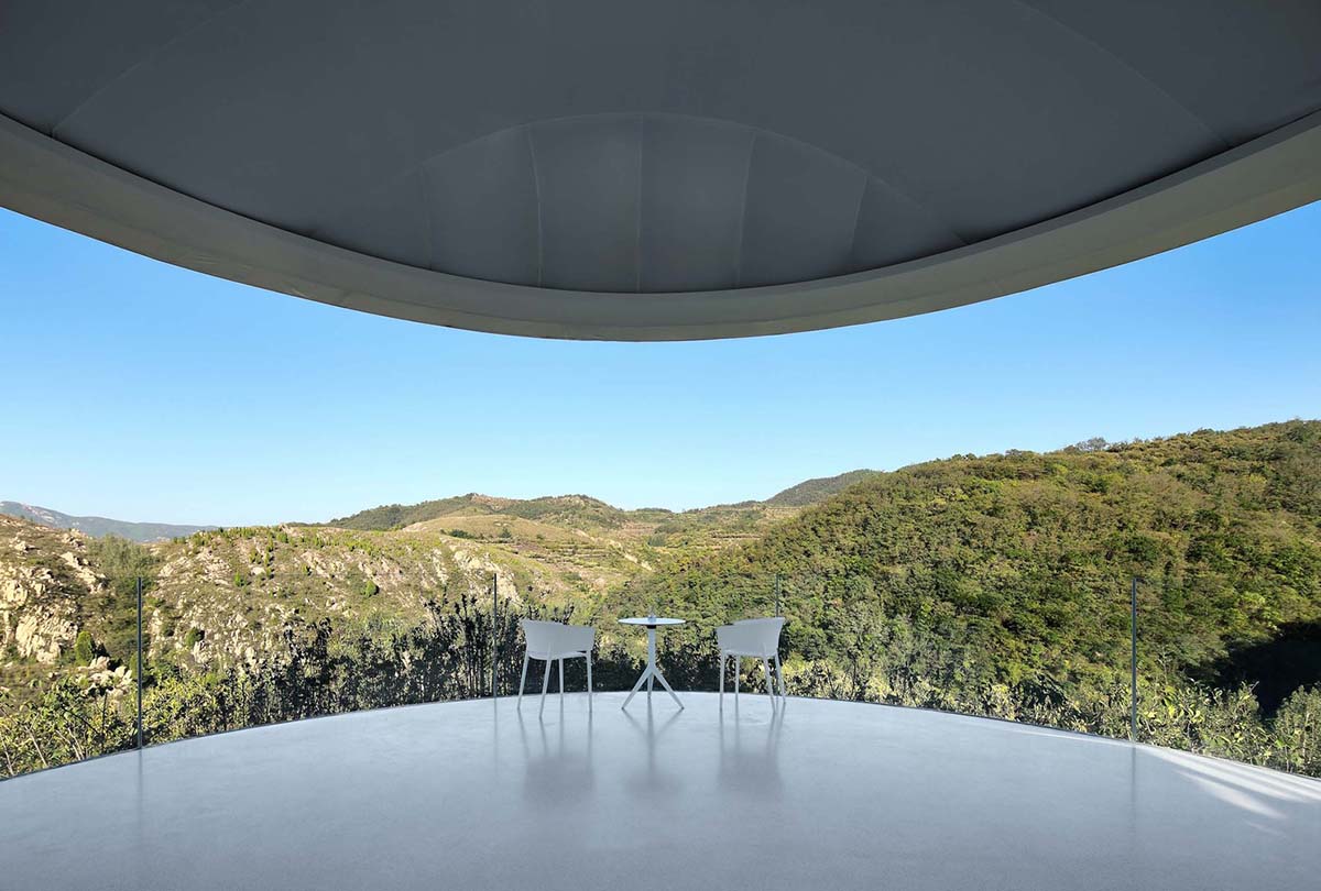 gad·line+ studio created could-like transparent and light reading space hovering in the mountains