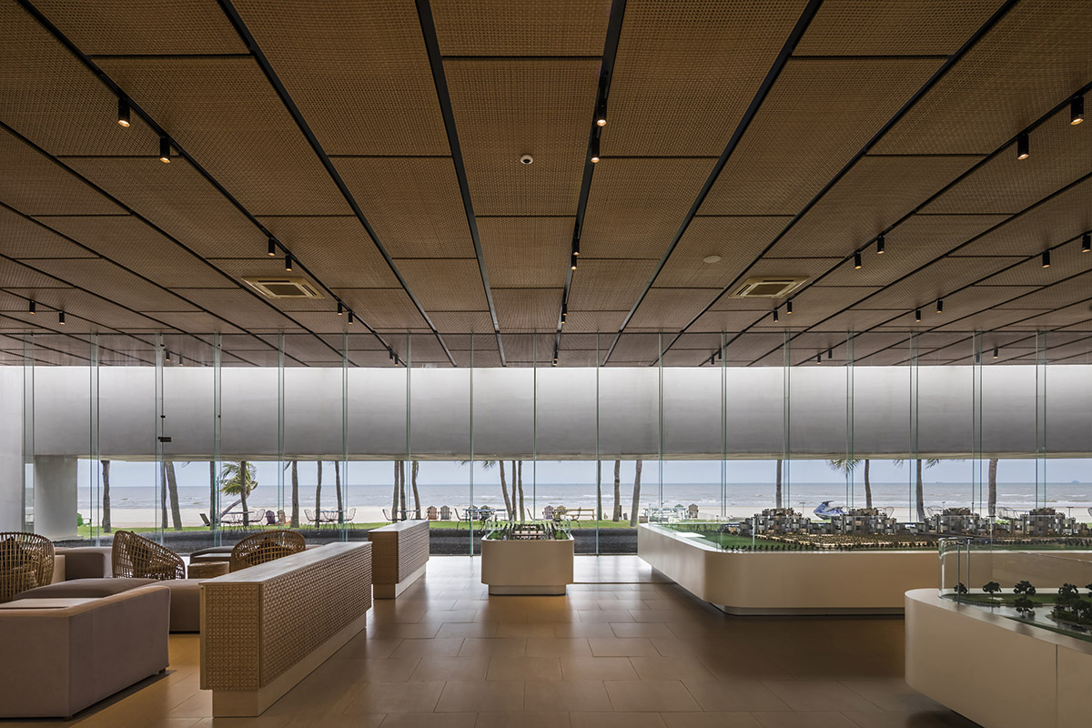 Six landscape boxes form this gallery and showroom by MIA Design Studio in Vietnam