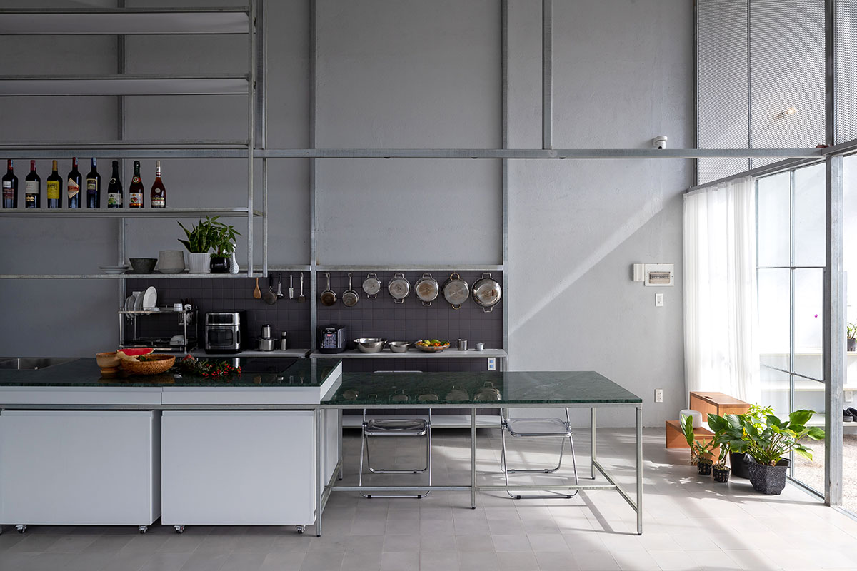 MIA Design Studio completes family house with angular roof in Vietnam 