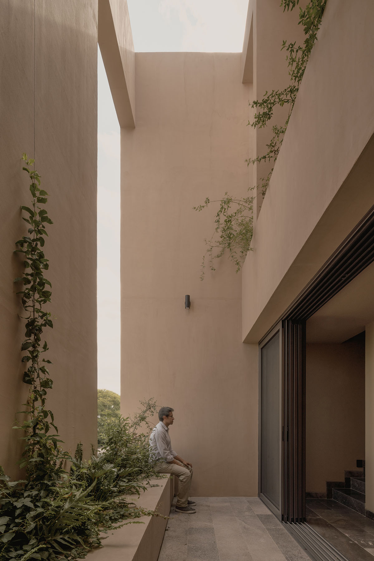 Taller Segovia Molina enriches beige Casa Aguilar with interior patios and an abundance of light
