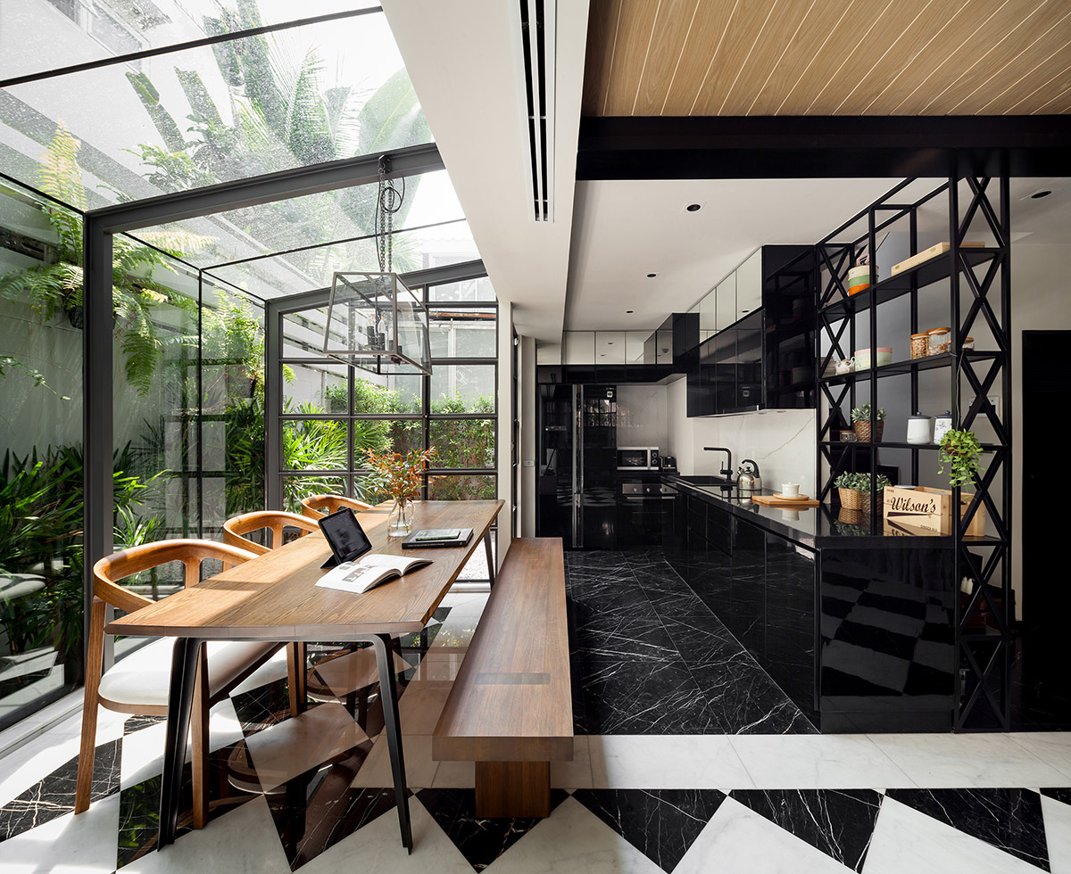 Anonym Studio renovated Bangkok’s old house with steel flower beds to create more openness