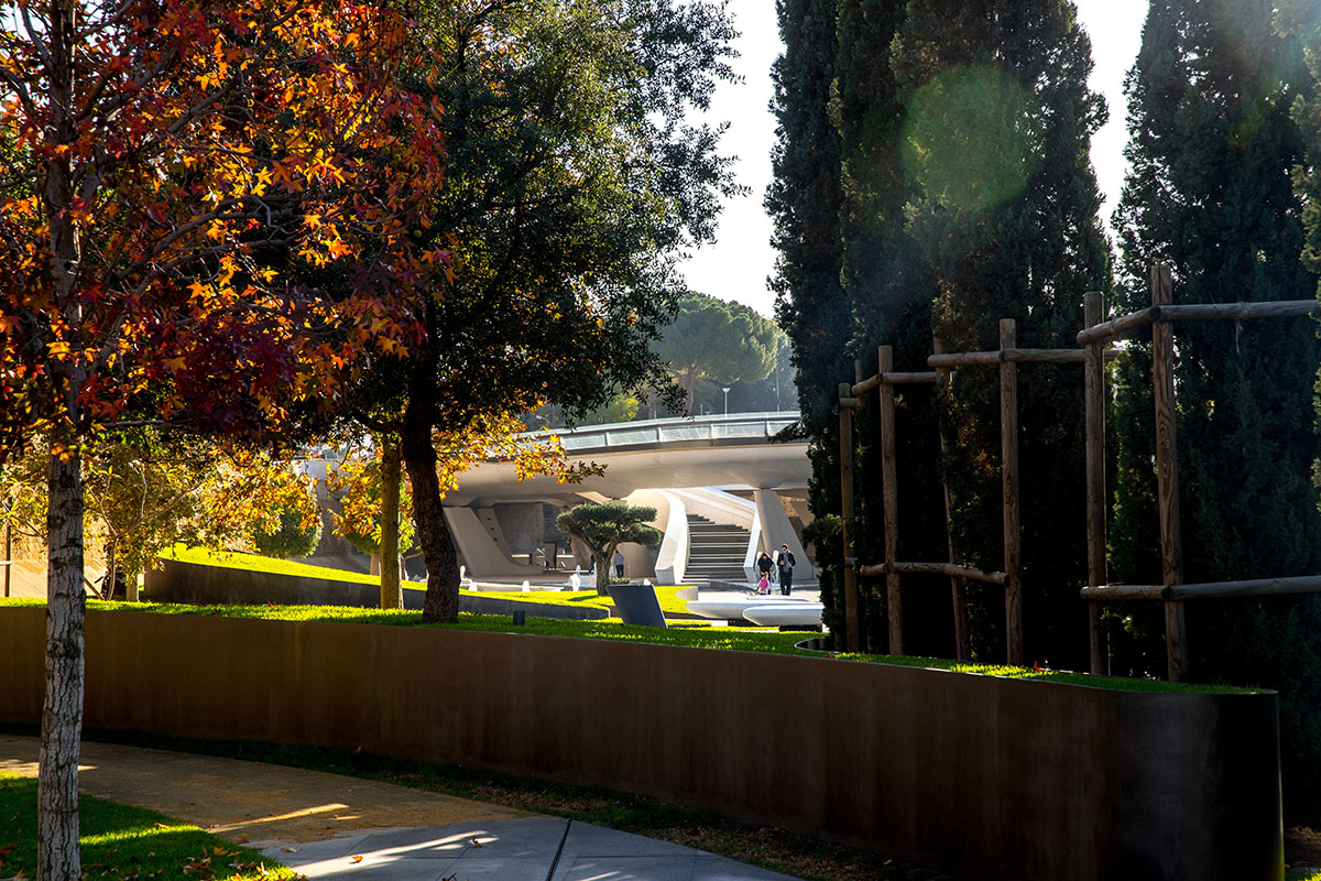 Zaha Hadid Architects designs urban park informed by fluid geometries opening the city's dry moat