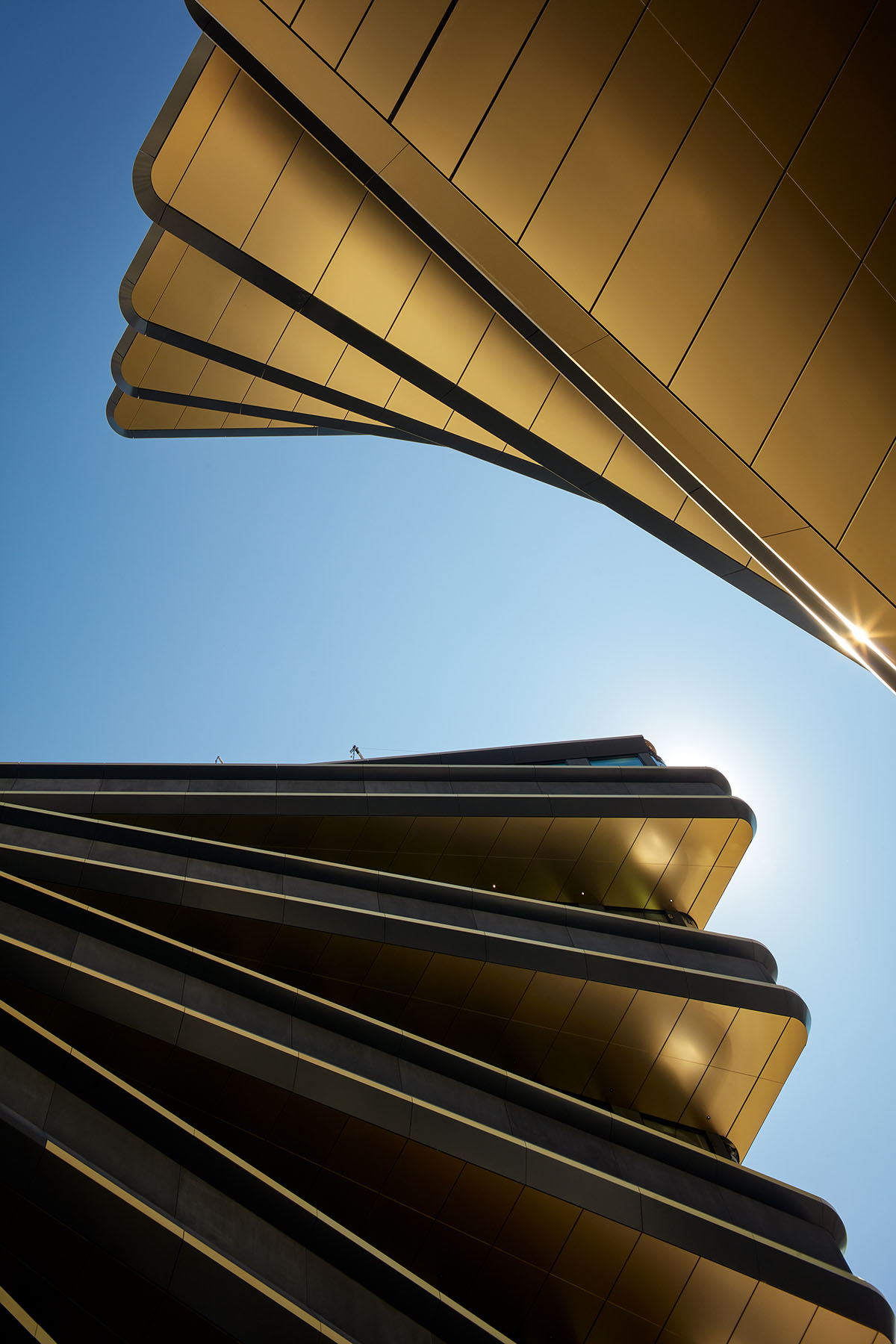 Zaha Hadid Architects completes Masaryčka building with golden vertical fins in Prague