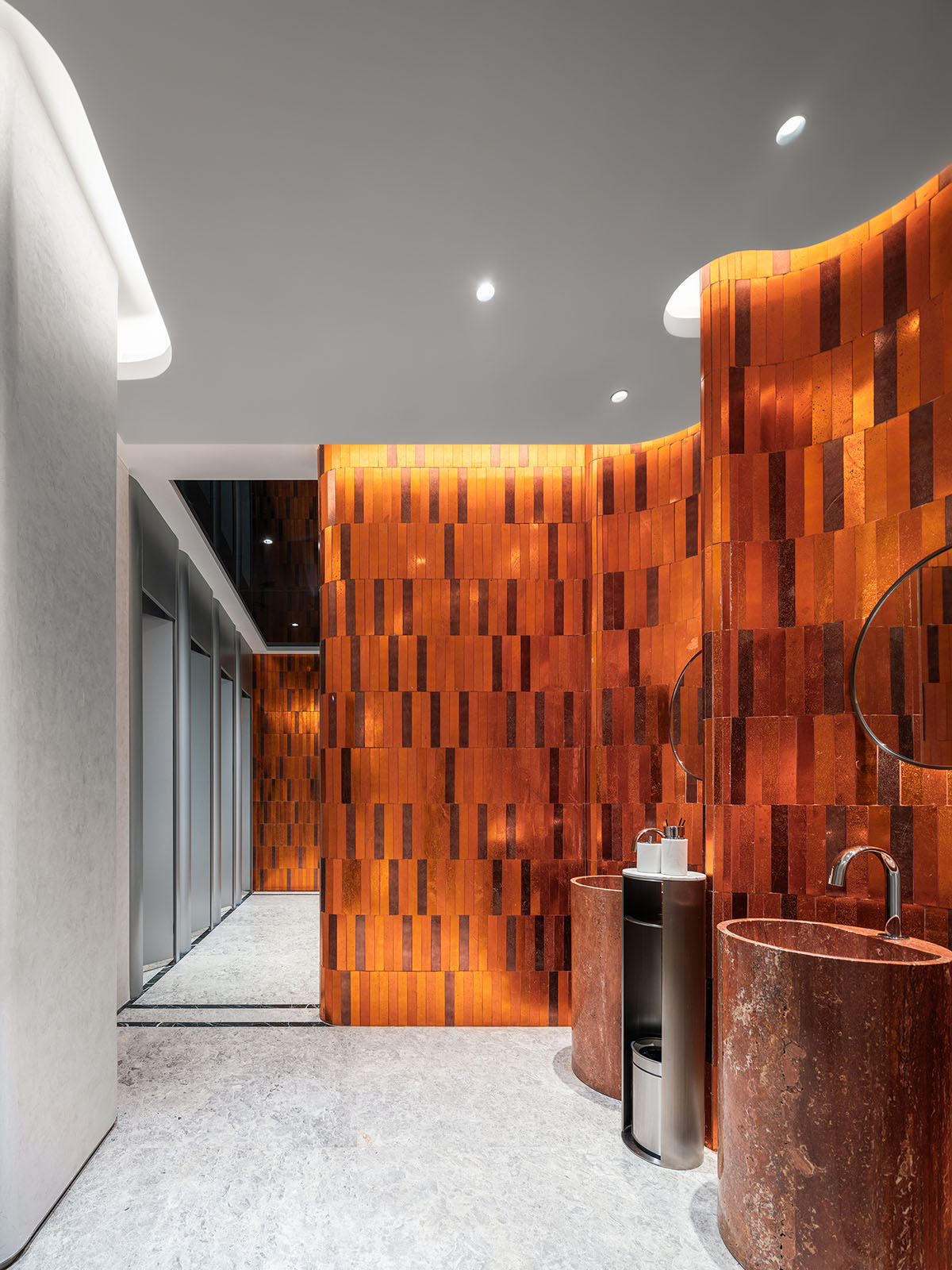 Undulating lines and expansive waves define interior of Orbit public exhibition hall in Shanghai 