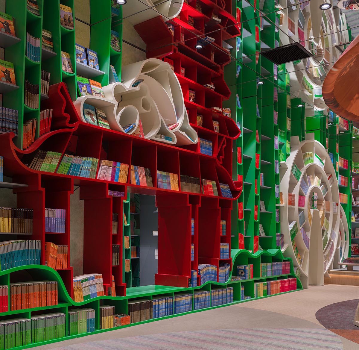 X+Living creates undulating walls and colourful interior for Chengdu Zhongshuge bookstore in China