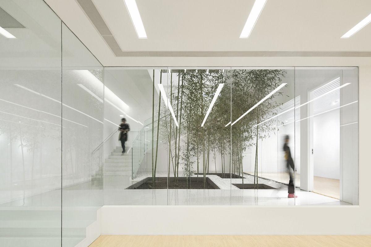 ARCHSTUDIO&rsquo;s new Children Education Institution features bamboo strips and white library wall