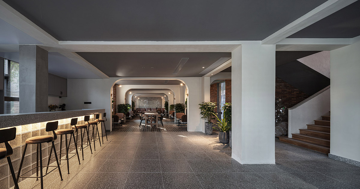 y.ad studio converts former hospital and old factory dormitories into homestay hotel in China
