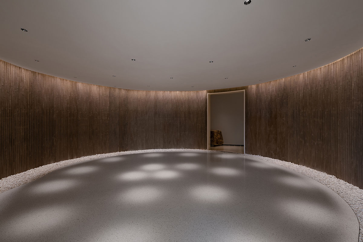 3andwich Design / He Wei Studio built circular library featuring a rooftop pool in China