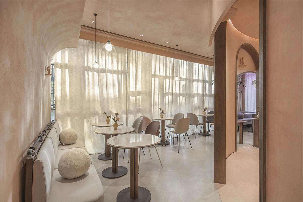 S&ograve; Studio combines metallic and pinkish-colored interior for Beijing store