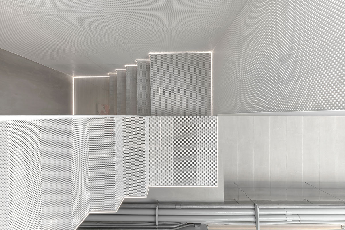 AUN Design Studio adds steel fence to private home for airy entrance in Bangkok