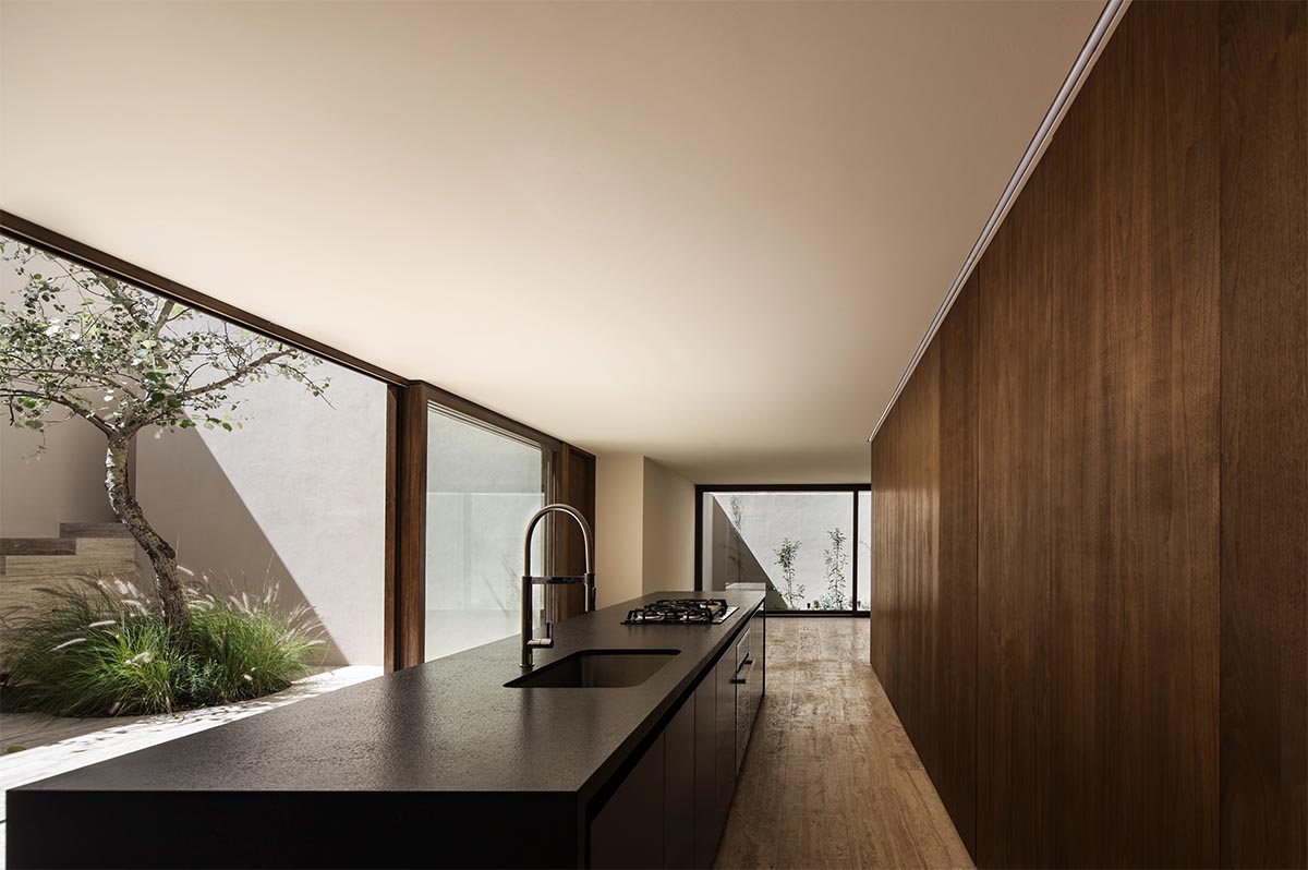 Sabino 10 residence by Editorial features a solid façade with hermetic volumes in Mexico