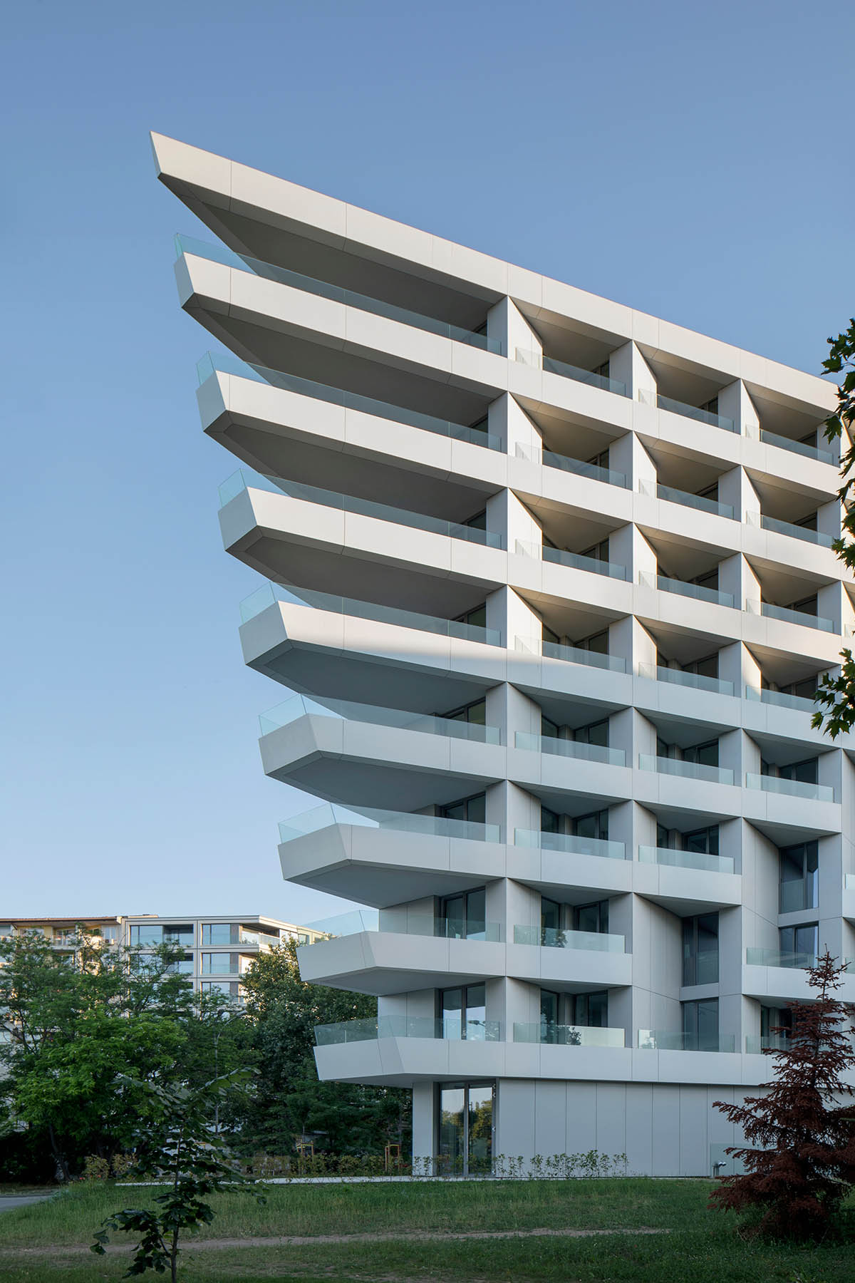 Sharp triangular balconies define this residential block designed by STARH in Bulgaria