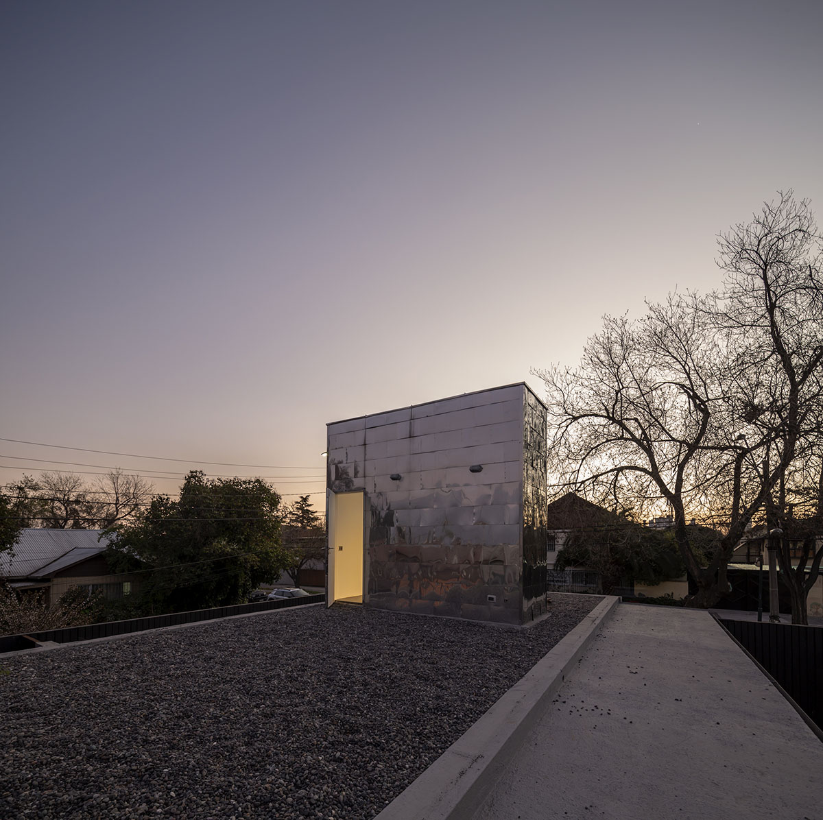 Rodolfo Ca&ntilde;as' hermetic family house defined by protruding skylight in central Chile