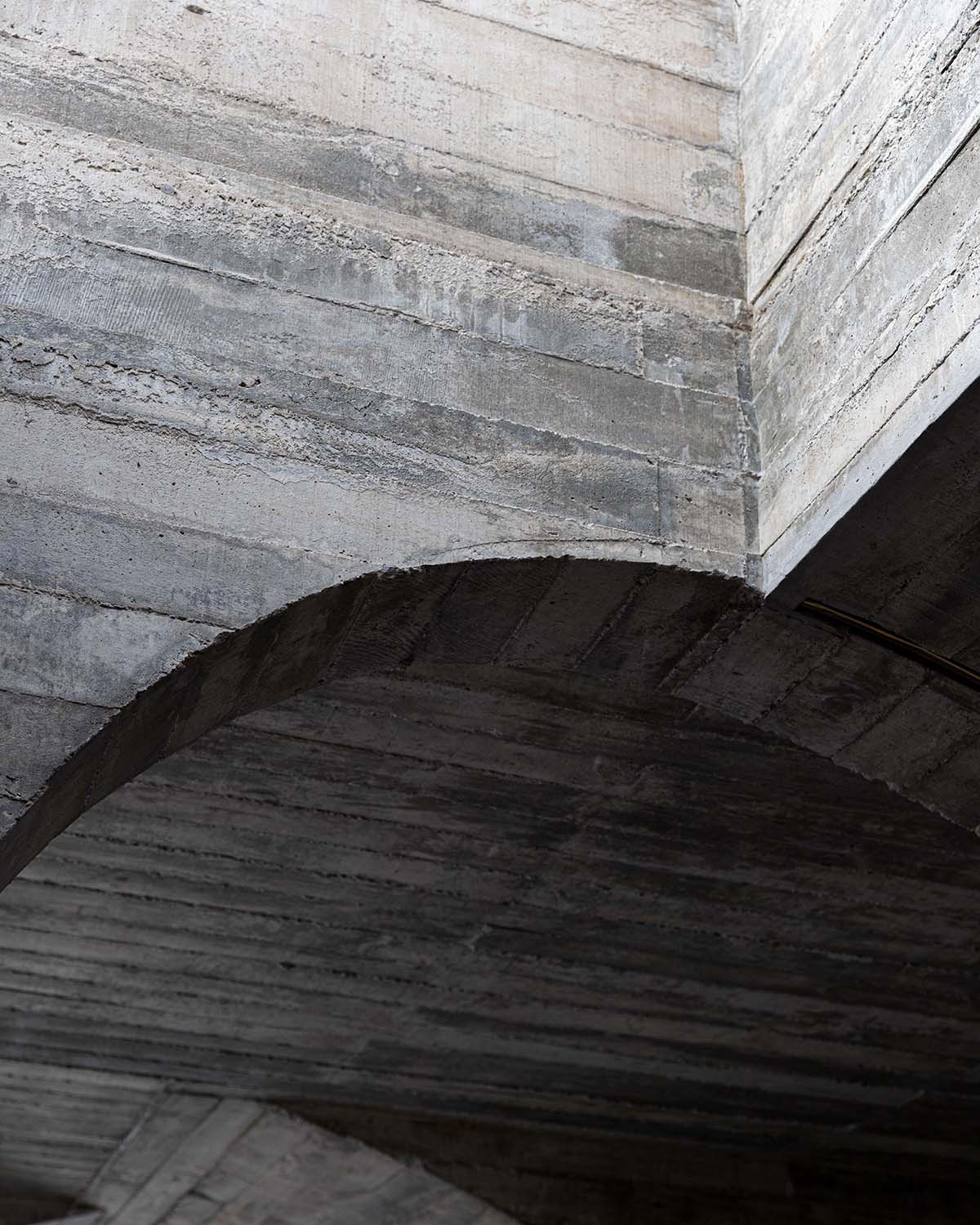 French Kitsch III is a cathedral-like cafe in Thailand that features imperfect arches