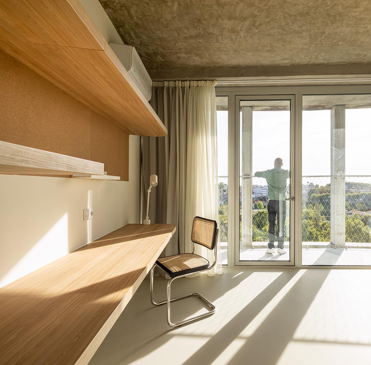 OODA completes cylindrical student housing with colonnaded skin in Porto, Portugal