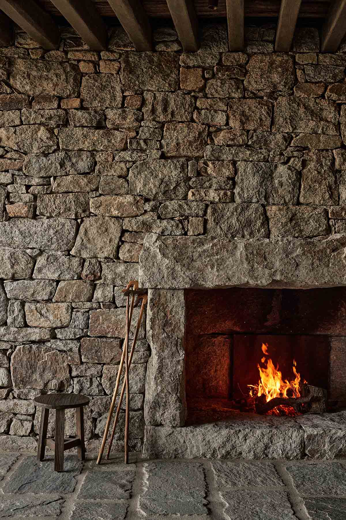 Terraced stonewalls sprawl down to offer an exploratory route in an old vineyard in Samos