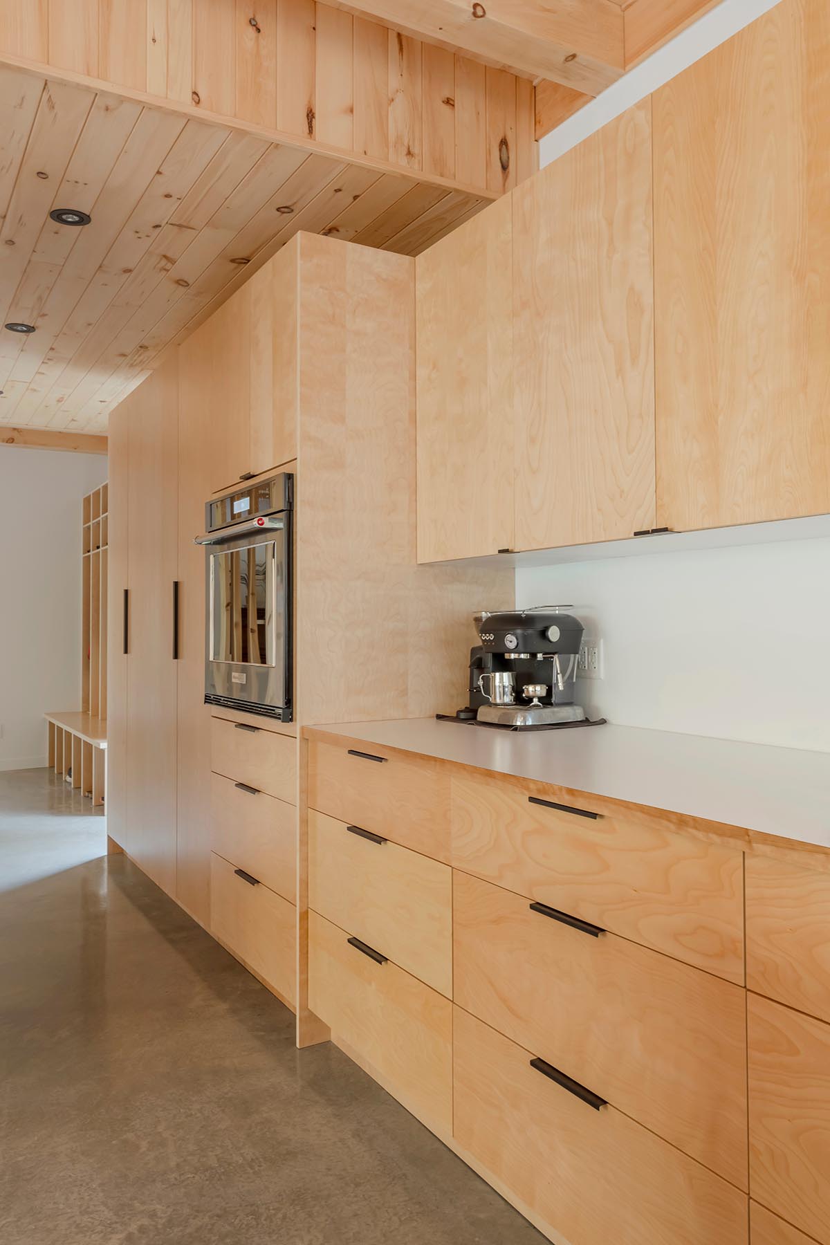 Country home is a wooden shelter that brings tranquility in the heart of the forest in Canada