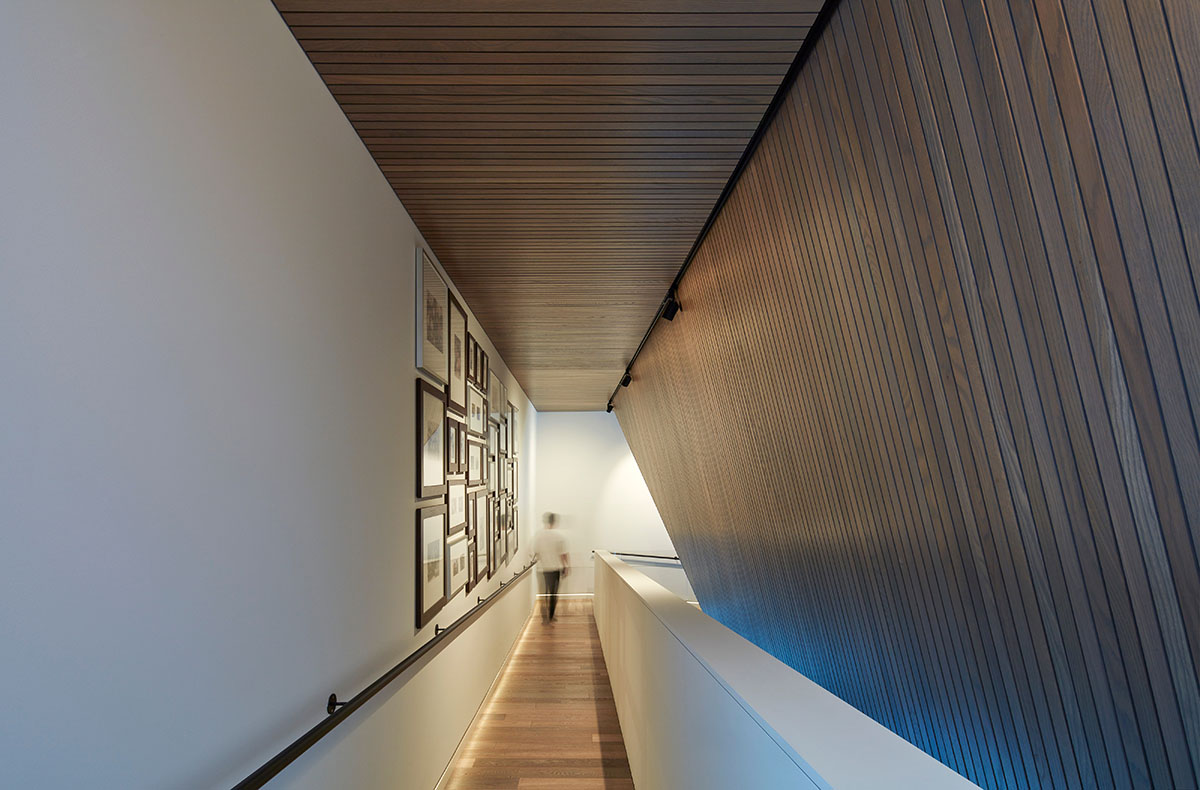 Weathered steel weil wraps the façade of Veil House in to resist snowfalls in Winnipeg