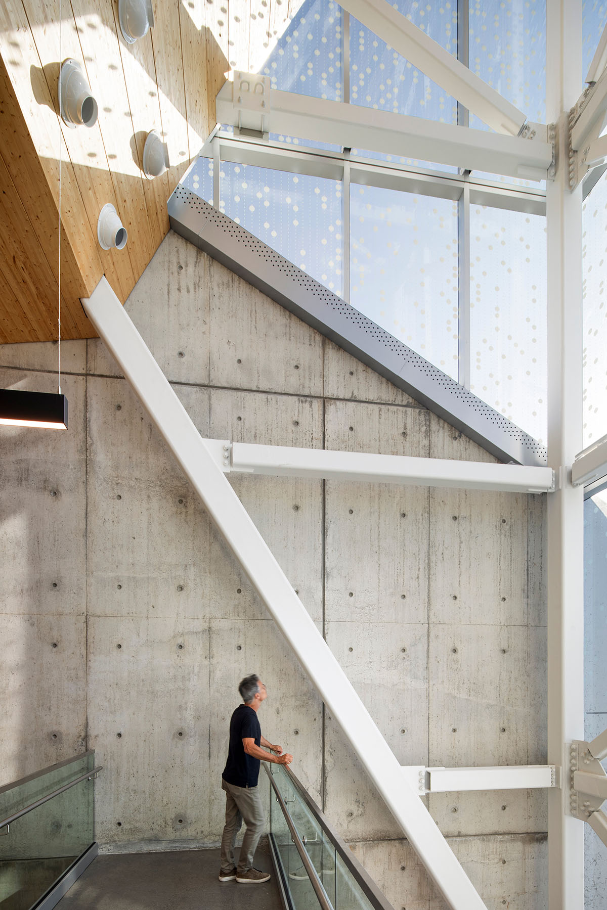 A striking bell tower pierces the sky, illuminating the grandeur of the pavilion in Montreal
