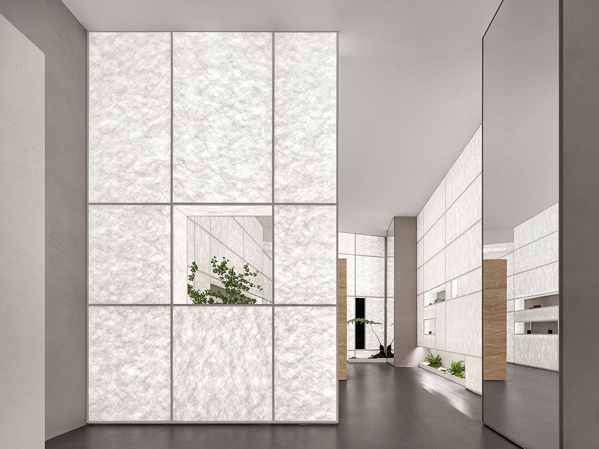 Luminous screen walls create fluid interiors for an optic store designed by Onexn Architects 