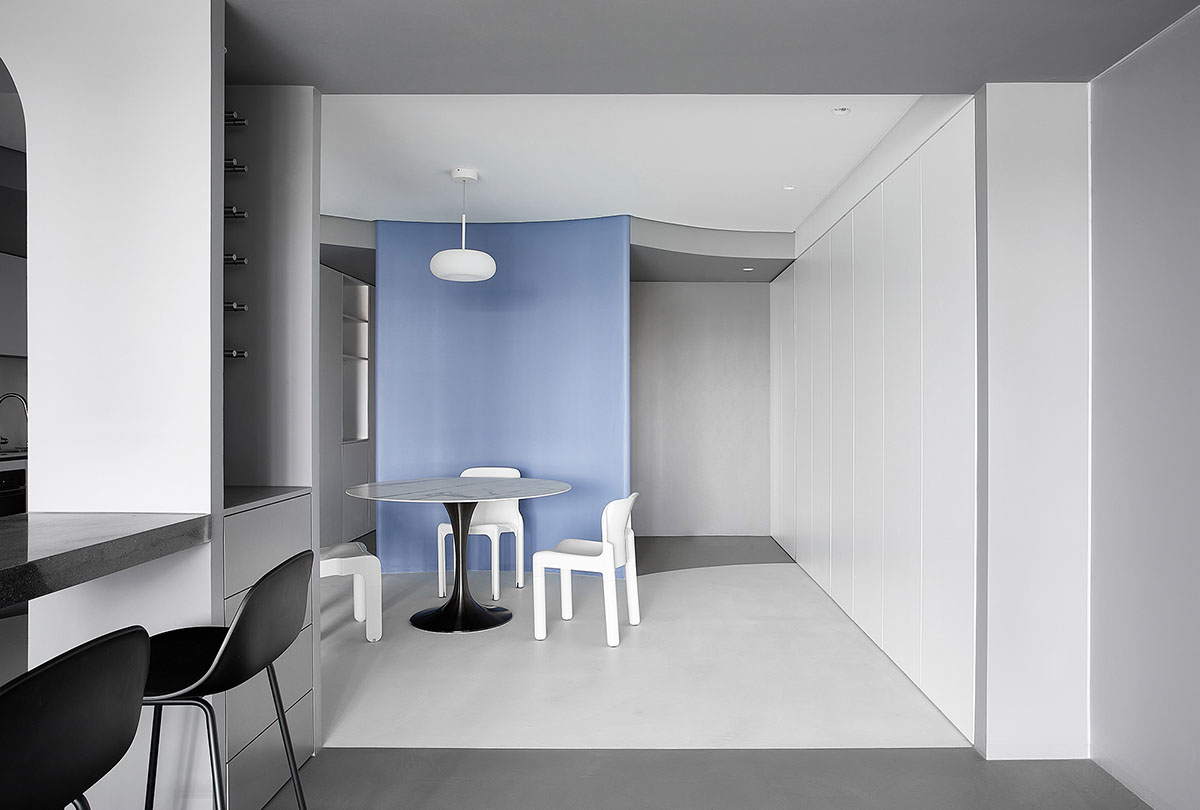 XIGO STUDIO creates gray and blue-colored interiors for apartment in Beijing 