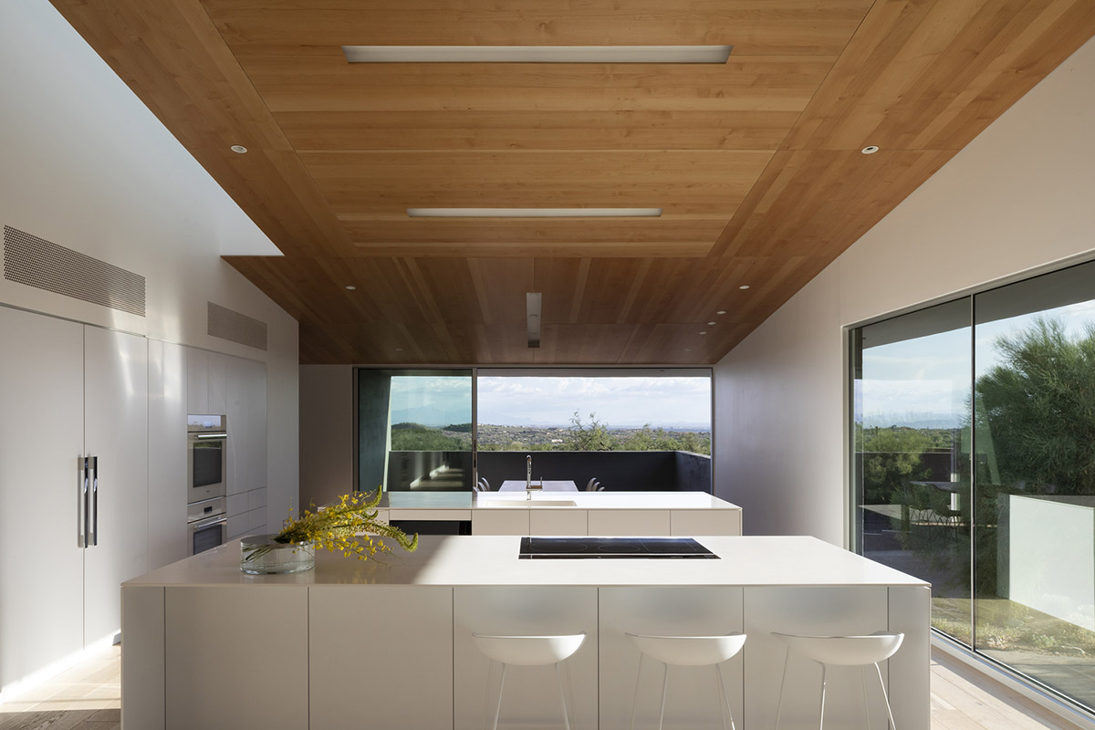 HK Associates Inc frames desert oasis with Ventana House featuring geometric protrudings in Tucson