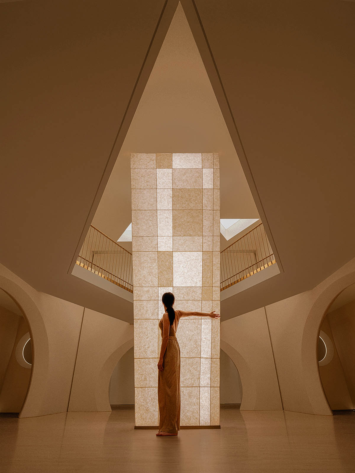 Beauty center interiors by CUN PANDA NANA embrace softness and organic feeling in cave-like space  
