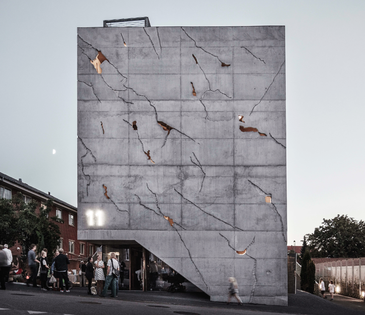 A collage of elements reflecting surroundings assembled on the facade of Office Building by SLETH