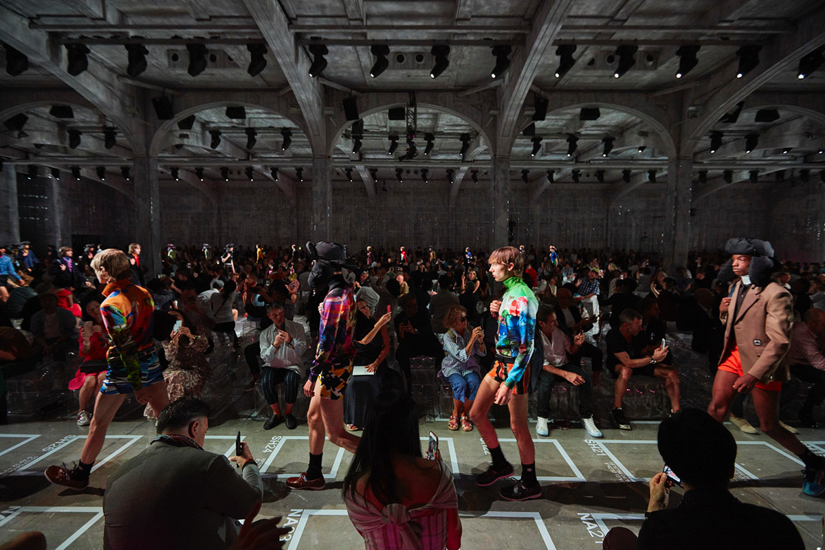 AMO Filled Prada's Fashion Show Stage With Purple-Lit Inflatable Stools
