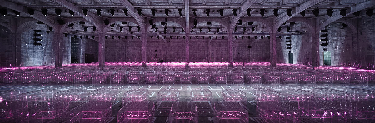 AMO Filled Prada's Fashion Show Stage With Purple-Lit Inflatable Stools