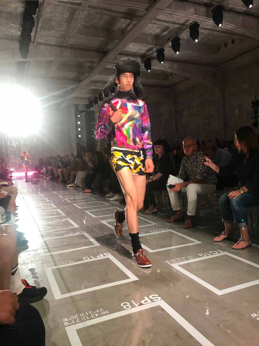 AMO Filled Prada's Fashion Show Stage With Purple-Lit Inflatable Stools