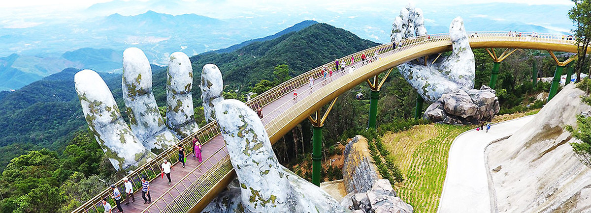 A Giant Pair Of Hands Lifts This Vietnamese Bridge Into The Sky