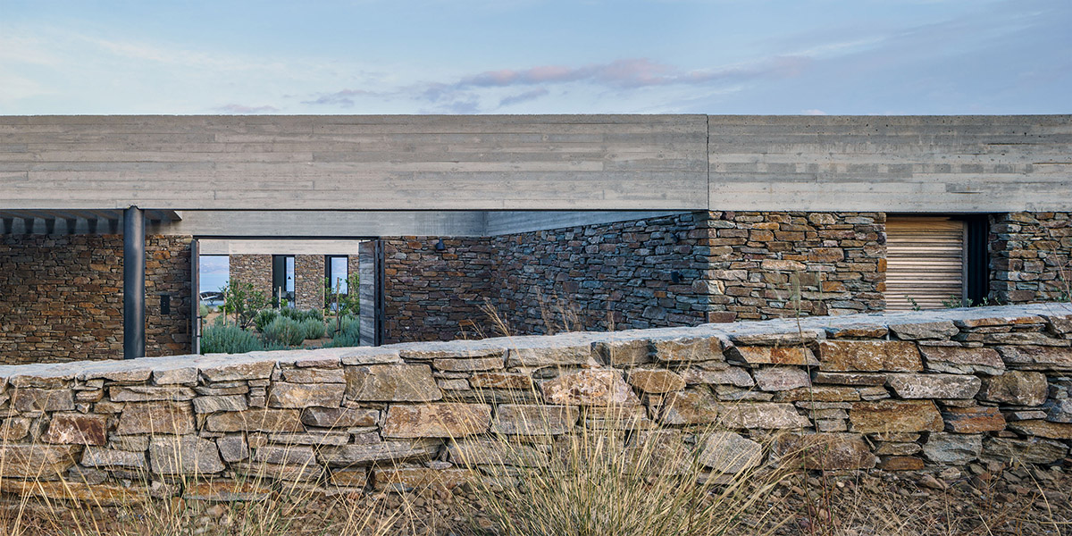 DecaACHITECTURE Completes Ring House On Top Of Deserted Landscape Of Crete