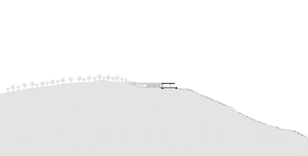 DecaACHITECTURE Completes Ring House On Top Of Deserted Landscape Of Crete