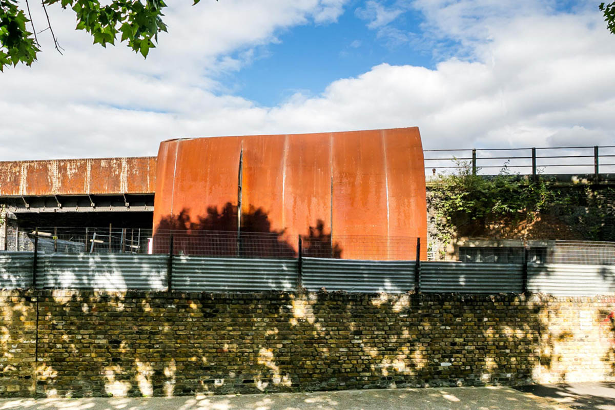 Undercurrent Architects' Live-Workspace Building Dominates City With Industrial Steel Exterior