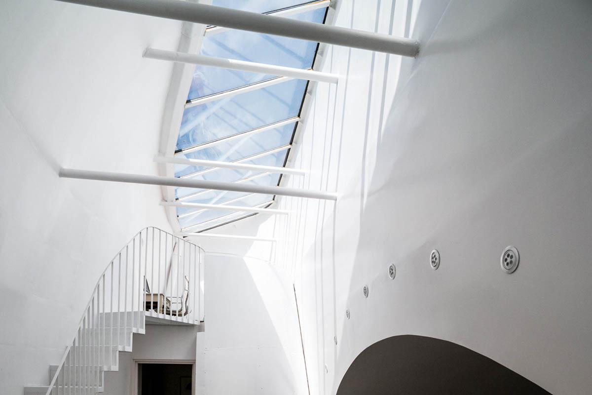 Undercurrent Architects' Live-Workspace Building Dominates City With Industrial Steel Exterior