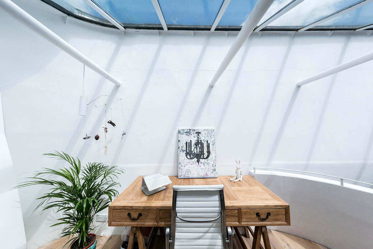 Undercurrent Architects' Live-Workspace Building Dominates City With Industrial Steel Exterior