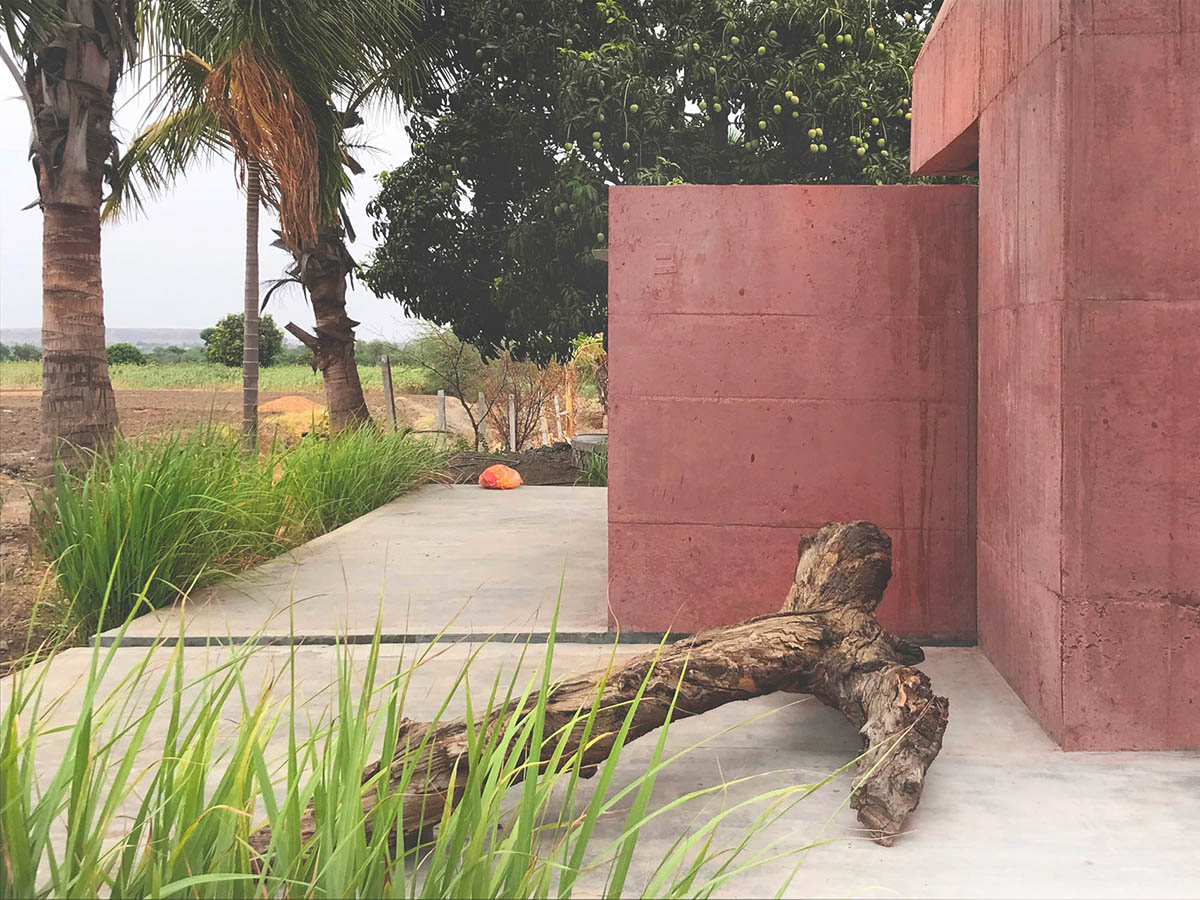 Karan Darda Architects Built A Sculptural Temple With Reddish-Colored Concrete Walls In Pune