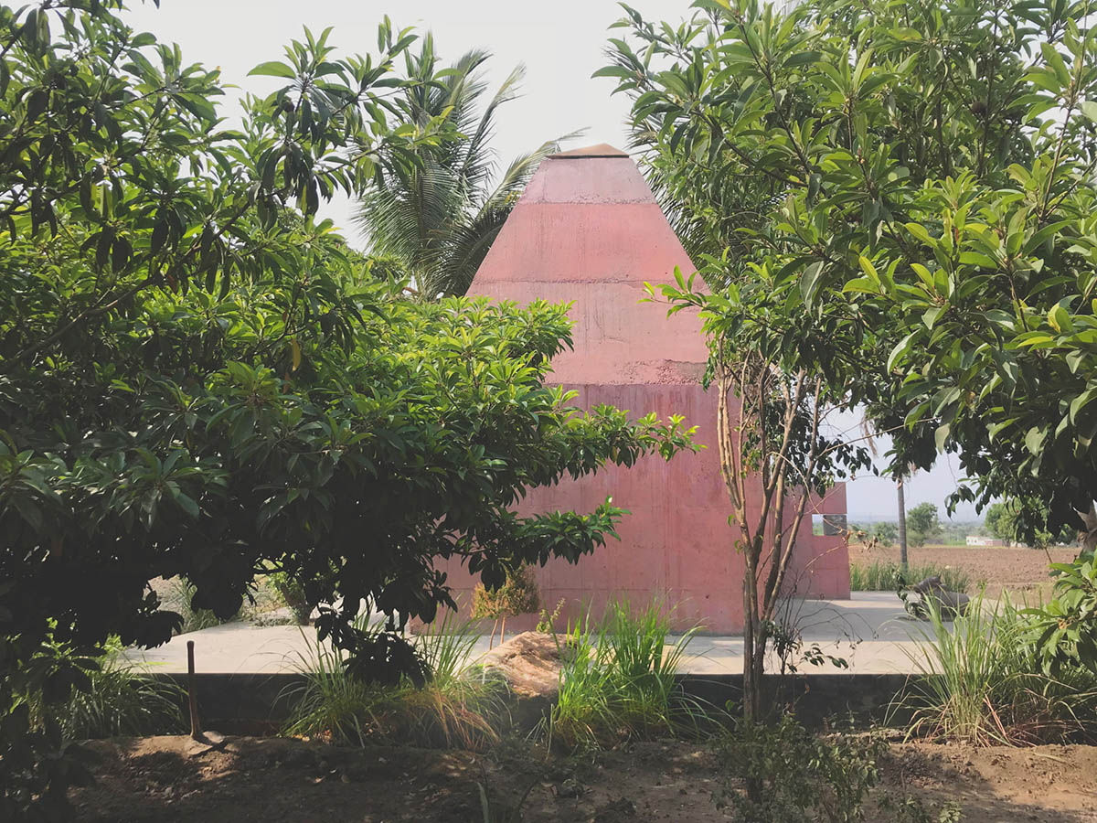 Karan Darda Architects Built A Sculptural Temple With Reddish-Colored Concrete Walls In Pune