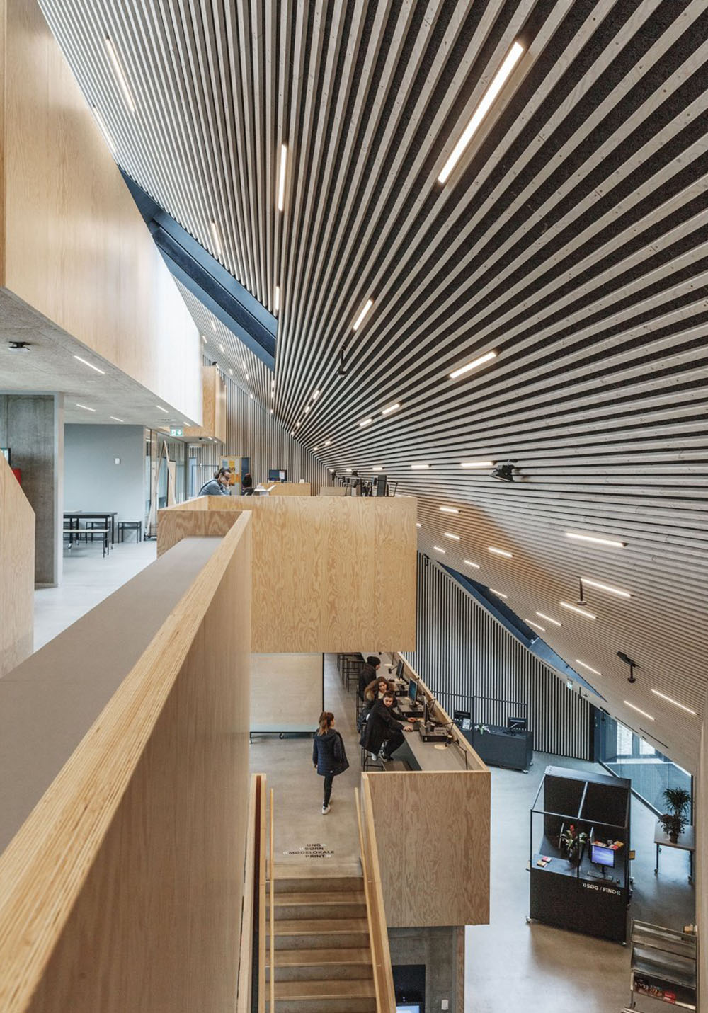 COBE's Funnel-Shaped Tingbjerg Library And Culture House Acts Like A Single Facade In Copenhagen