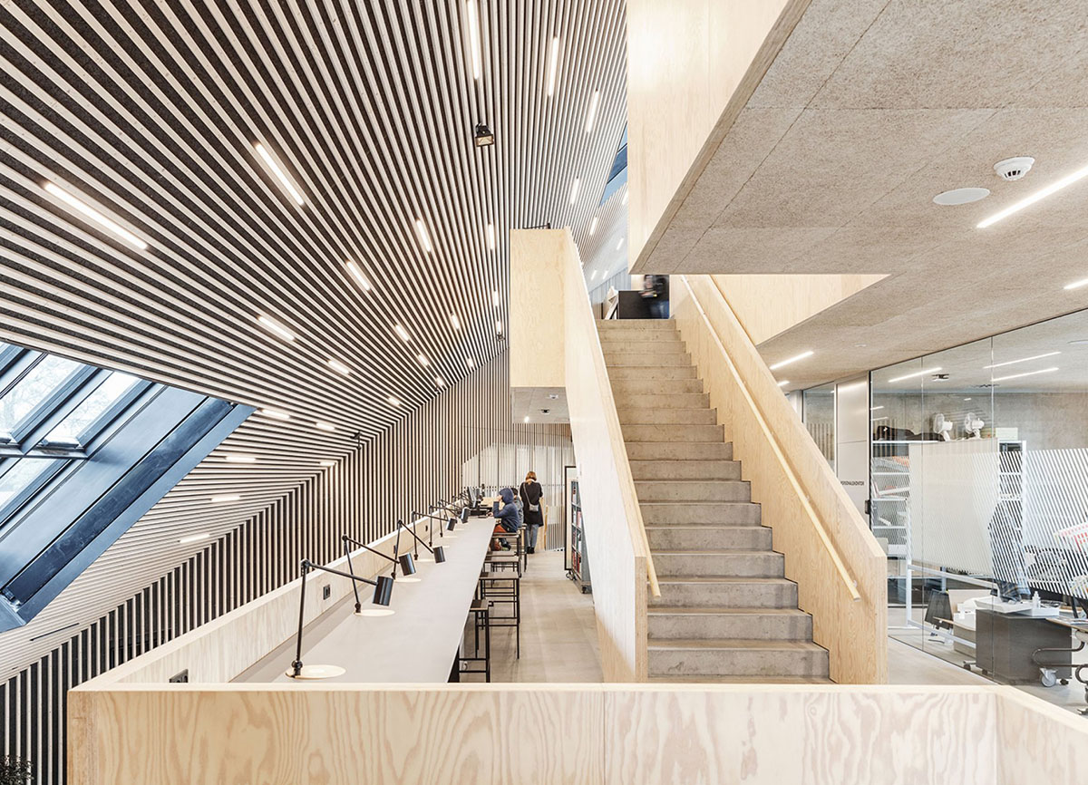 COBE's Funnel-Shaped Tingbjerg Library And Culture House Acts Like A Single Facade In Copenhagen