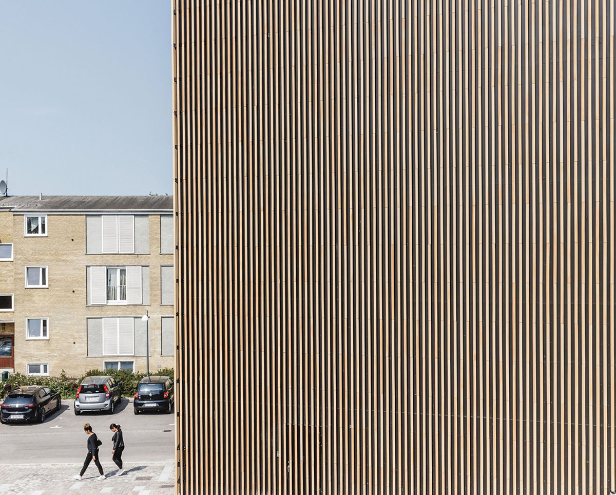 COBE's Funnel-Shaped Tingbjerg Library And Culture House Acts Like A Single Facade In Copenhagen