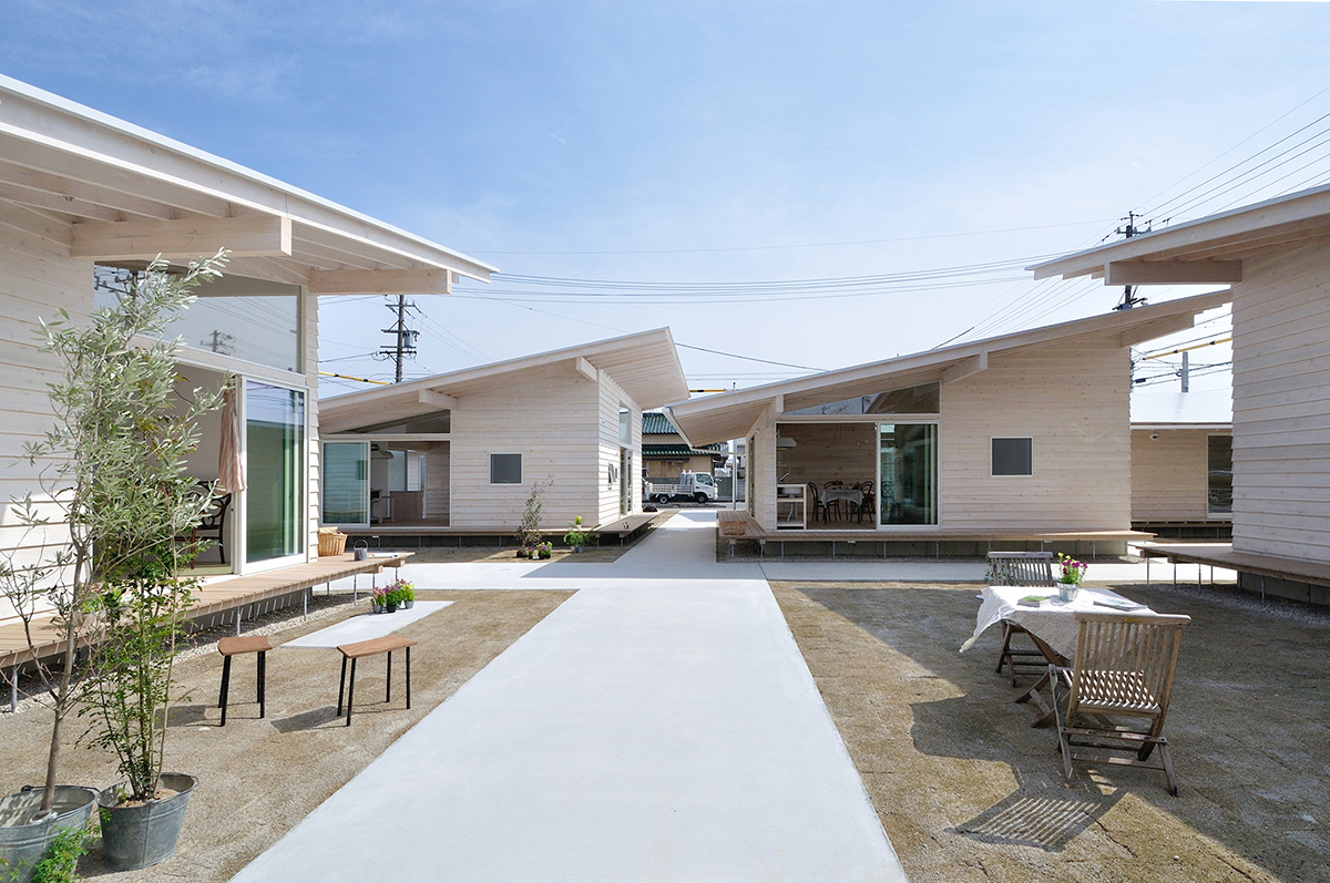 Studio Velocity Transforms 1950s Stacked Housing Complex Into Flat Wooden Apartments In Japan