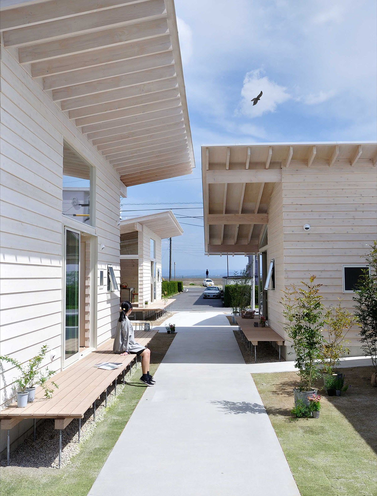 Studio Velocity Transforms 1950s Stacked Housing Complex Into Flat Wooden Apartments In Japan