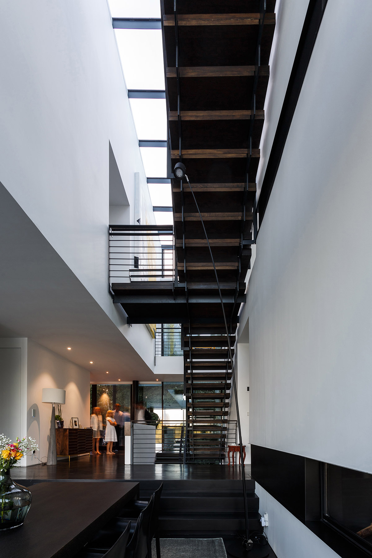 Mecanoo Completes Glass Villa With Dark Stripes On A Lake In Lechlade