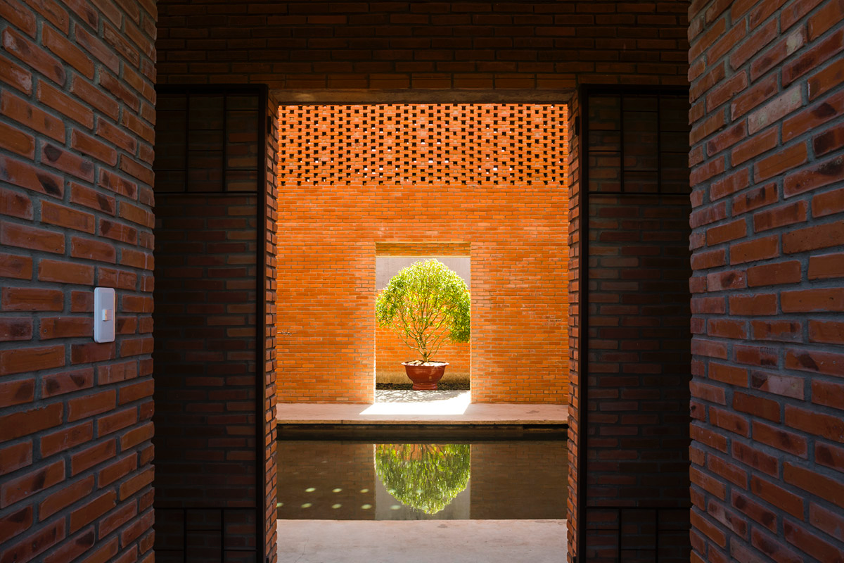This Innovative Brick House In Vietnam Creates Continuous Internal Spaces