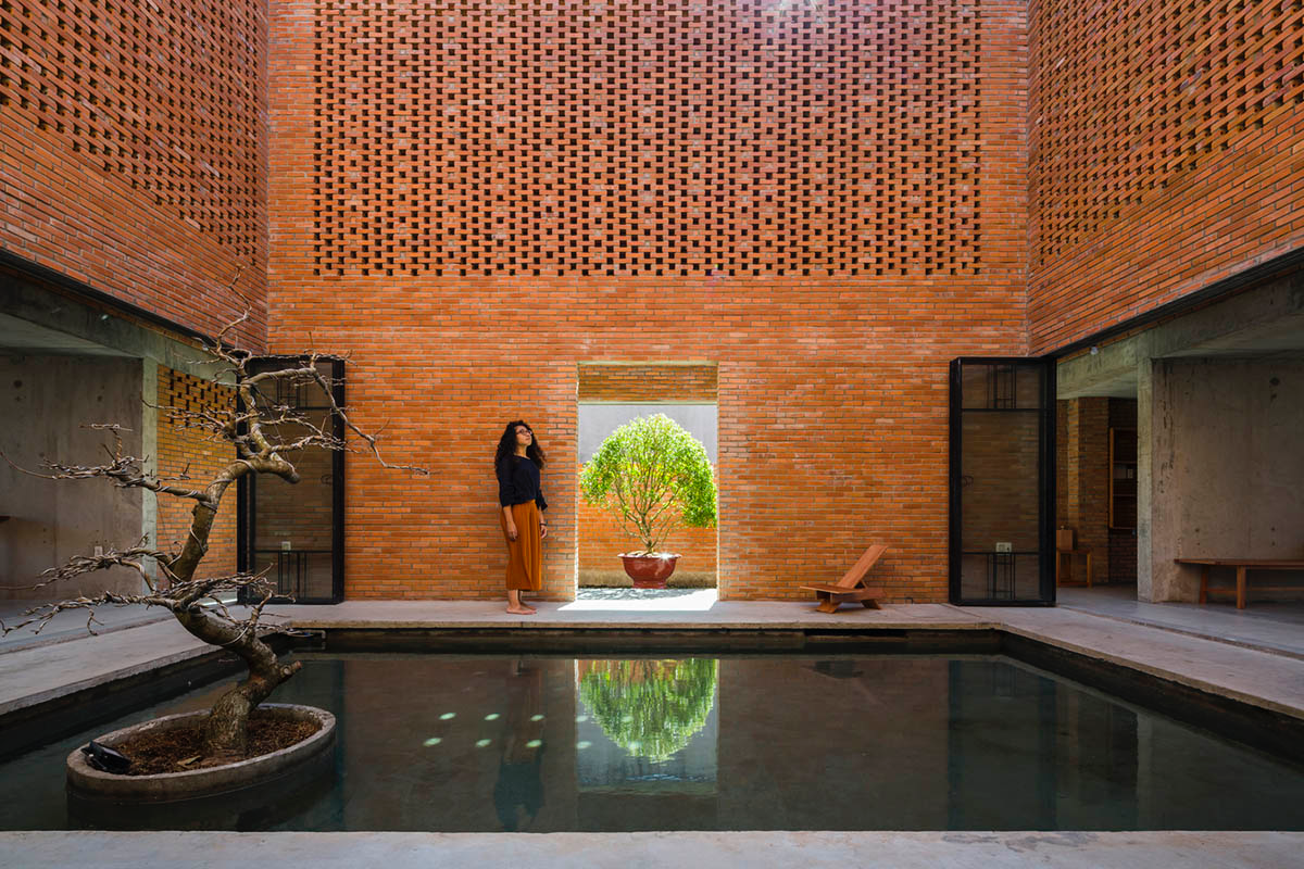 This Innovative Brick House In Vietnam Creates Continuous Internal Spaces