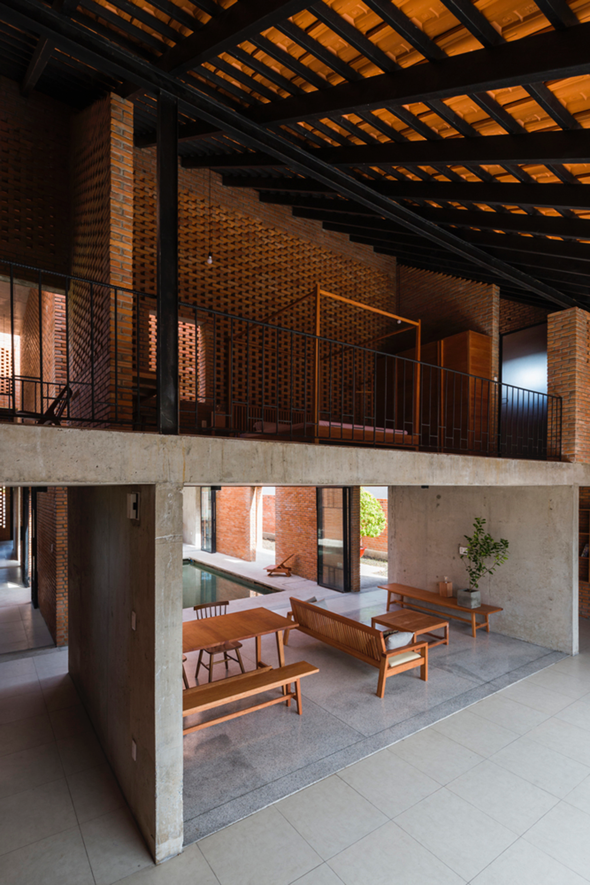 This Innovative Brick House In Vietnam Creates Continuous Internal Spaces