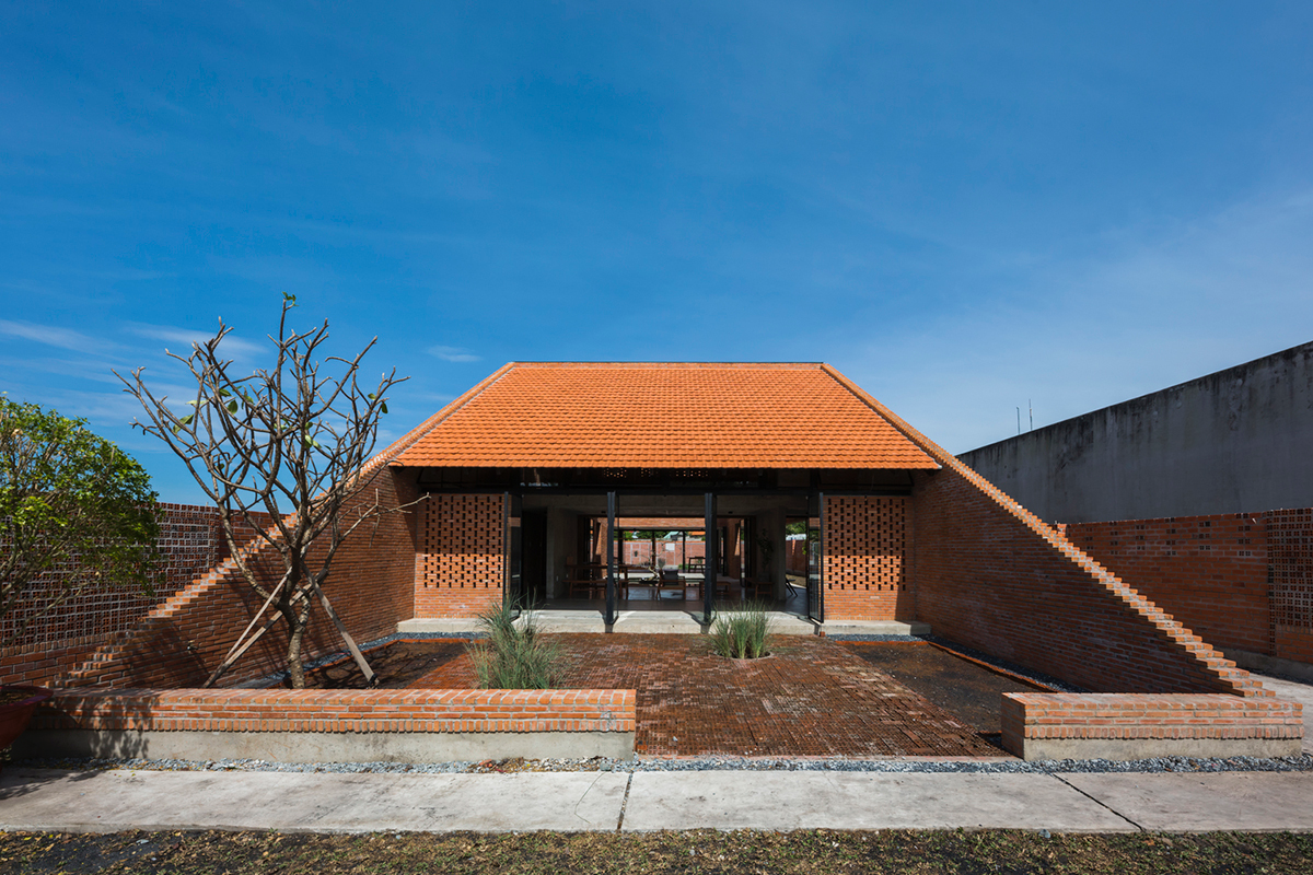 This Innovative Brick House In Vietnam Creates Continuous Internal Spaces